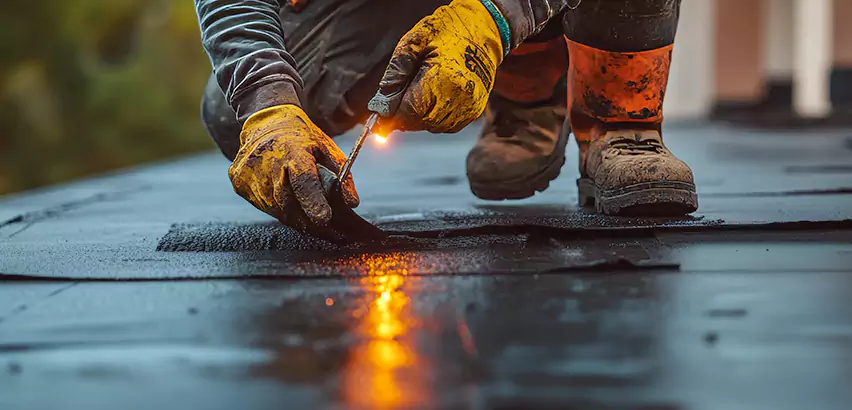 EPDM Roof Repair Tape Application in Burlington
