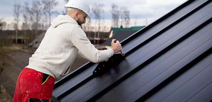 Tin Roof Ridge Cap Installation in Burlington